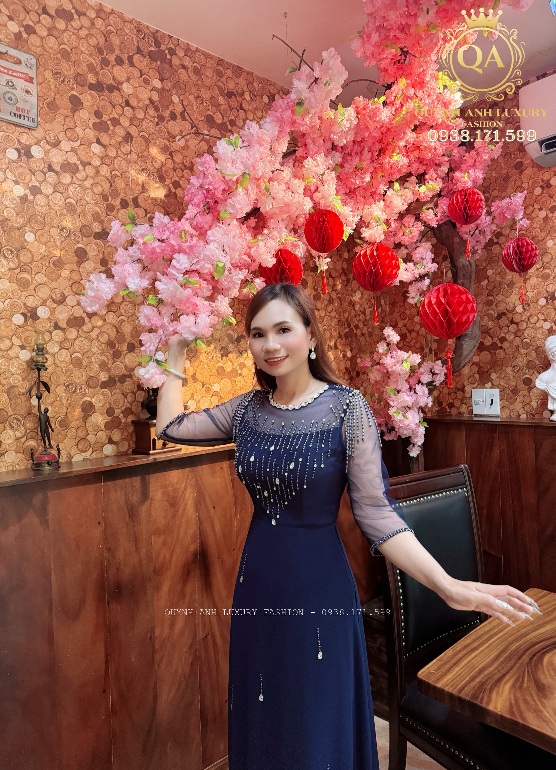 ao-dai-dinh-da-pha-le-mau-xanh-den-sao-mai-1